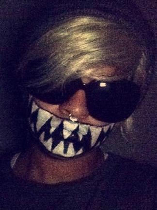 Mya in 2015, testing a humongous toothy-grin makeup